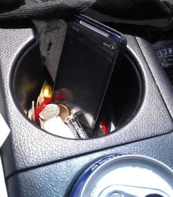 Phone in Messy Cupholder